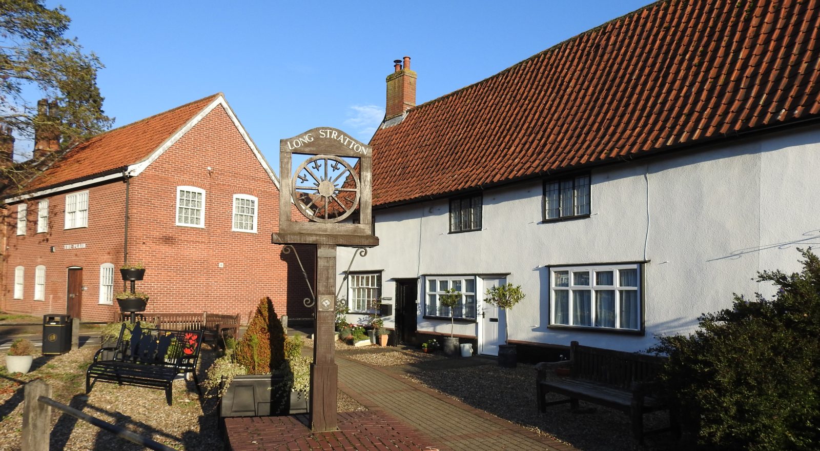 Long Stratton village sign, The Plain
